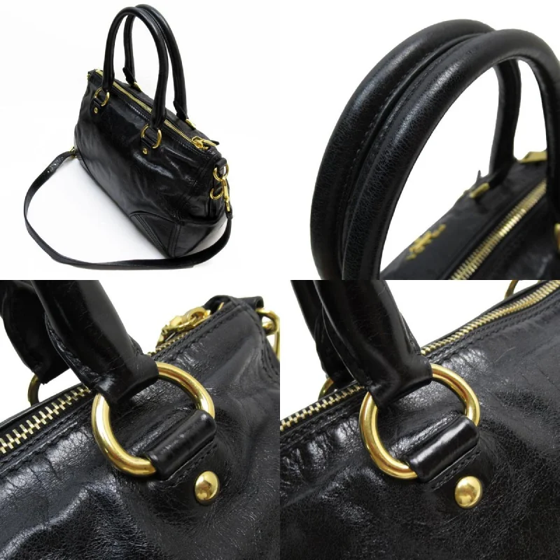 Designer bags with gold hardwarePRADA Saffiano Handbag