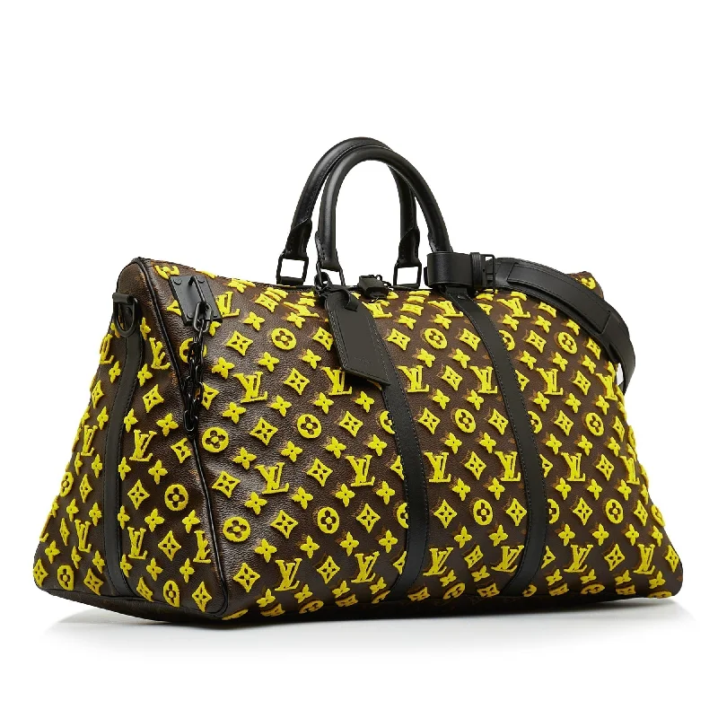 Luxury bags with exotic skinsLOUIS VUITTON Monogram Tuffetage Triangle Keepall Bandouliere 50 Travel Bag