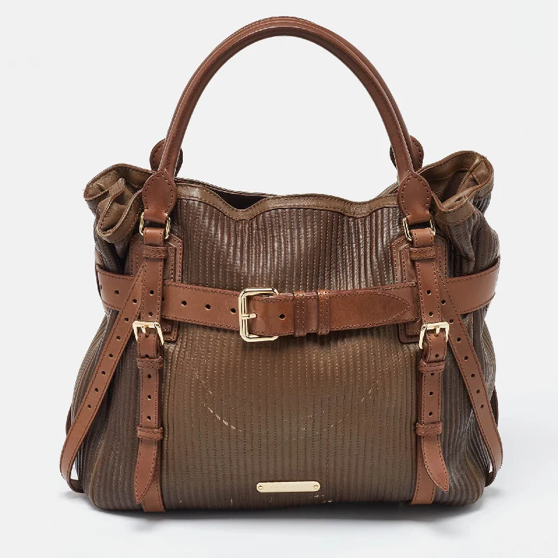 Water-resistant travel backpacksTwo Tone Brown Leather Stitched Bridle Tote